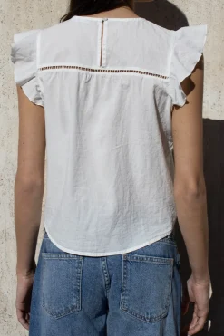 Blusa con volante