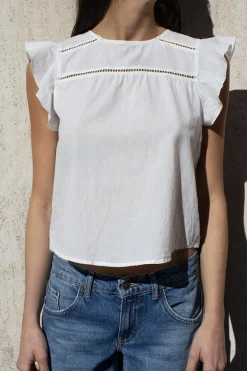 Blusa con volante