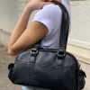 Bolso bolsillos laterales