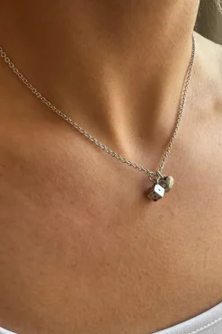 Collar corazón y dado