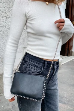 Pochette con tachuelas